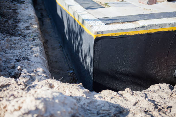 Professional Emergency Waterproofing technician working in Arlington, MN